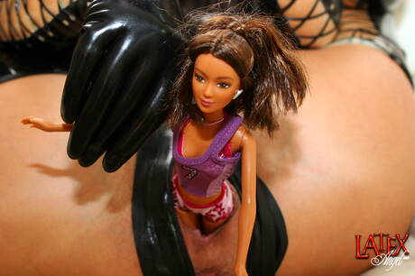 Latex Angel invites you to browse their xxx photos with female adolescent in masturbating with dildo